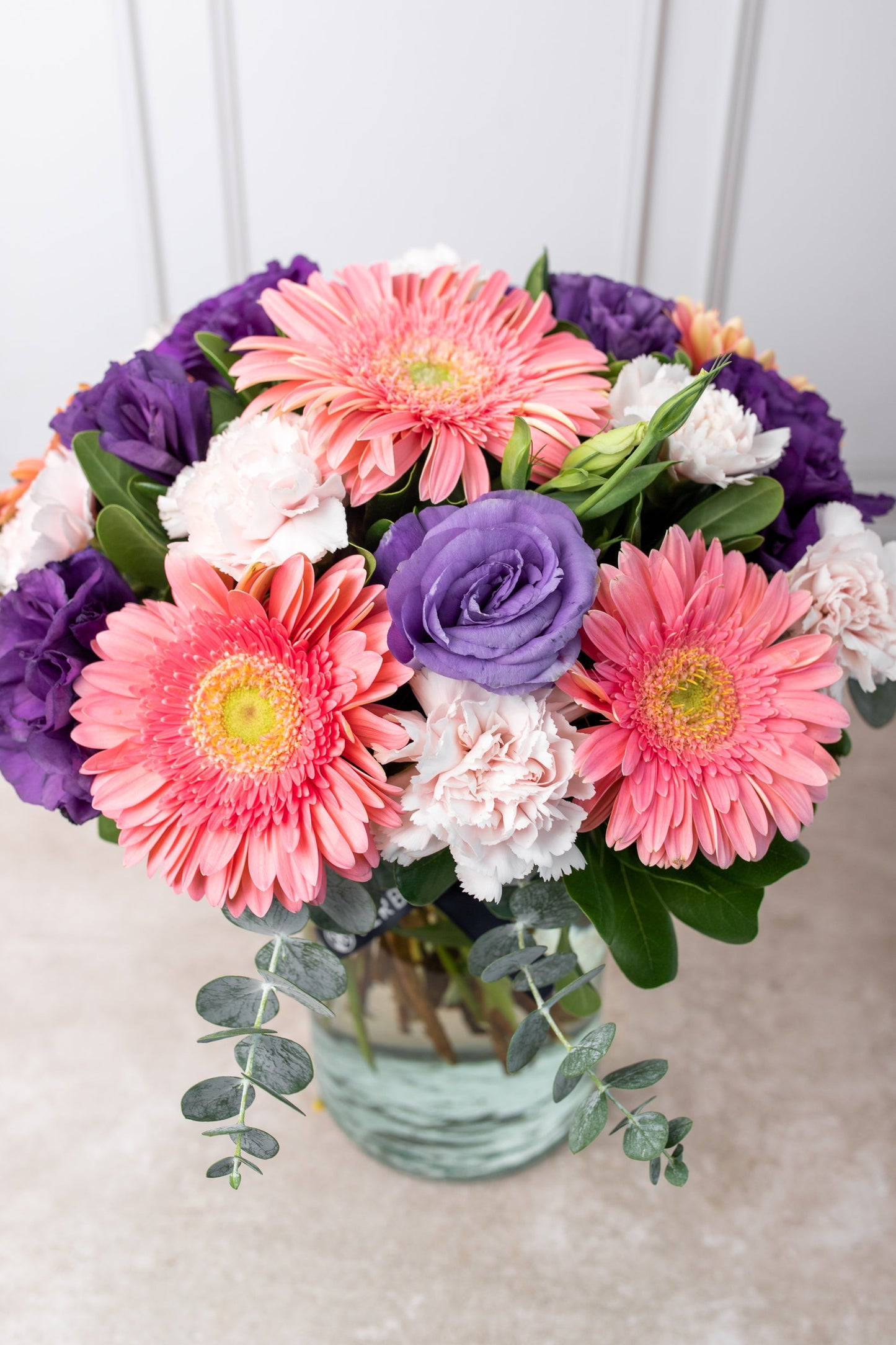 Coral / Gerbera Rosa, Lisianthus Morado y Clavel Rosa CHIH.